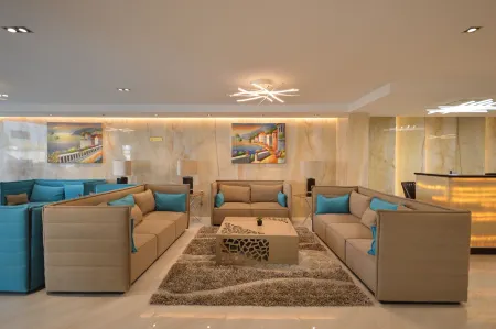 Rahhal AlBahr Serviced Apartments Отели рядом с достопримечательностью «Abbar and Zainy Building»