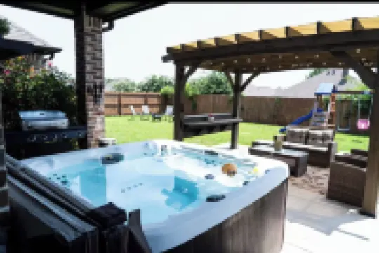 Family Fun 3BR Getaway with Hot Tub and Play Yard