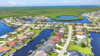 AMAZING!! Remodeled Punta Gorda waterfront home; HEATED SALT POOL; golf nearby