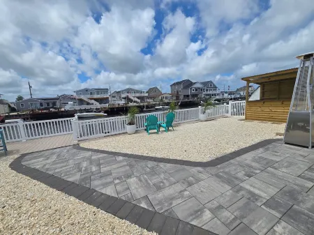 Beautifully updated waterfront home great for families & friends +beach badges.