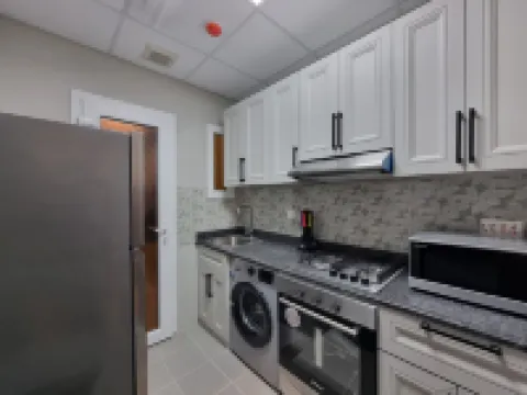 Charming 2-bedroom apartment with WiFi, fitness room in peaceful Salalah