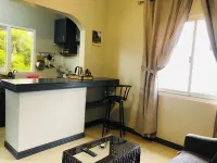 Studio apartment with pool and ocean views .