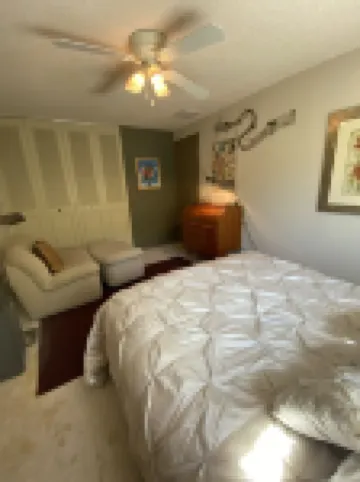 Elegant Townhome, park-like setting. Local event transportation provided.