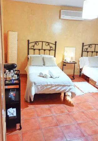 Discover La Casa de las Violetas in the heart of Ecija Отели в г. Эсиха