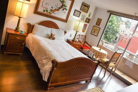 Modern two-bedroom apartment furnished in a classic style