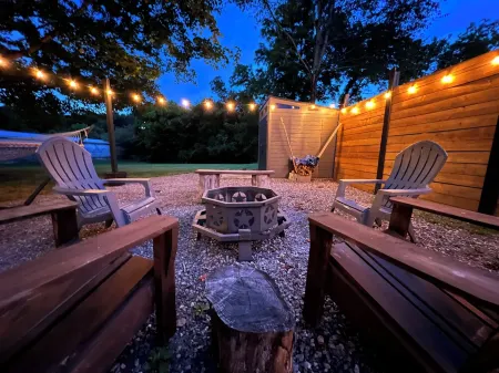 Main Street Getaway- Peaceful Yard with Hammock and Firepit