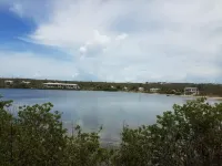 The third house on the shoreline in an exclusive section of the Tom Hill area.