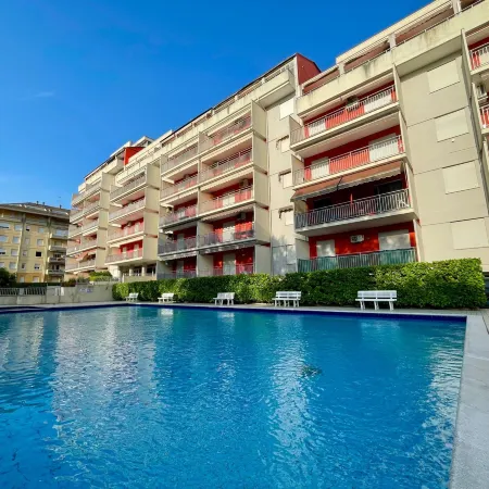 Modern poolside stay with balcony
