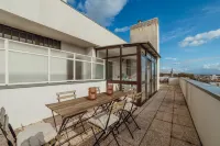 City Center Grand Apartment with Seaview Terrace by Vacationy