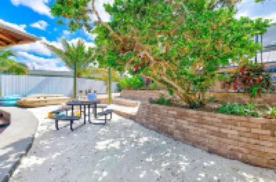 Waterfront oasis with private heated & screened pool, dock w/boat lift. 3BR/2BA