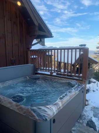 Stunning Mountaintop Retreat with High End Amenities and Four Fireplaces