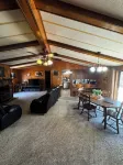 Quiet cabin in the woods w/ access to pools, river, & lakes in gated community!!