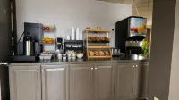 Travel Inn - Desayuno