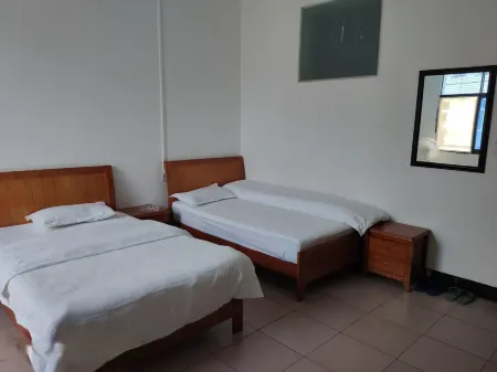 Yijia Station Отели в г. Сяоган