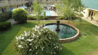 Golden Manor Inn & Suites - Bares