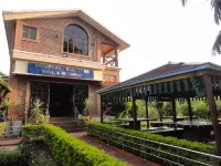 Whispering Woods Inn !! Bitm College Opposite !! Hotels in Dakshin Harirampur