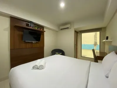 New and Homey Studio Apartment at Warhol (W/R) Residence Hotels in Kecamatan Semarang Selatan
