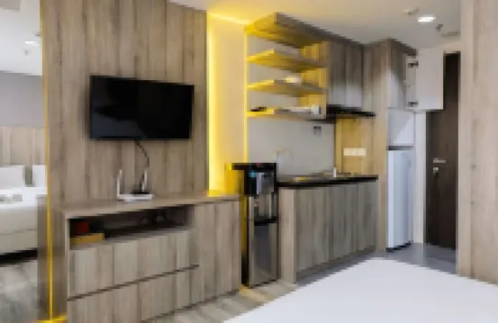 Minimalist Studio Room at Bintaro Icon Apartment by Travelio