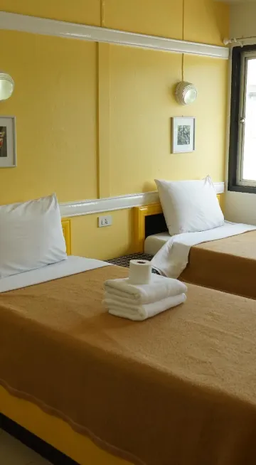 ห้องเตียงแฝดพร้อมห้องน้ำ