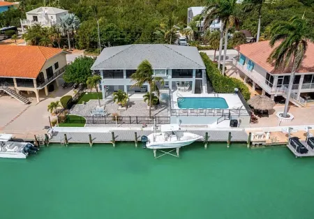 Family & Pet-Friendly Duck Key Home – Heated Pool, 90’ Dock, Ocean Access