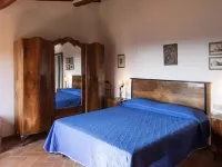 Farmhouse in the greenery of the Tuscany countryside with private pool and view ムルロのホテル