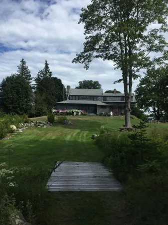 Classic, on the water stunner! Owner occupied with full amenities!