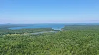 Newly built and fresh vacation home tucked in the woods of Mount Desert.
