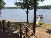 Lakefront rustic log cabin. Any season vacation, get away, or retreat.