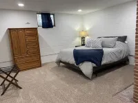 Newly Remodeled Brick Home with wall Sculptures by the Airport