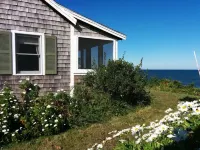 Beachfront cute cottage on Private  Beach. Best View on the Cape.  on high bluff