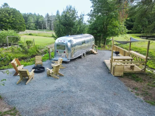 Glamping in Vintage Airstream with modern comforts with private pond access.
