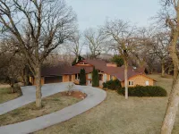 Huge Retreat with Heated Pool and Hot Tub by Briggs Woods Walking Trail and Golf Hotels in 