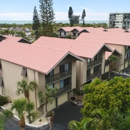 Steps to#1 Rated Beach in USA Spacious2+2Condo,Pool,GarageTranquil Setting