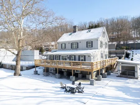 Historic Estate on a Serene Pond, Complete with Sauna, Jacuzzi, and Playground