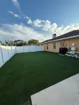 The Perfect Gateway Home with a large pool area, Gazebo, all fenced in.