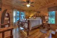 Lakeside Cabin w/ mountain views, dock, fire pit, hot tub, and much more!