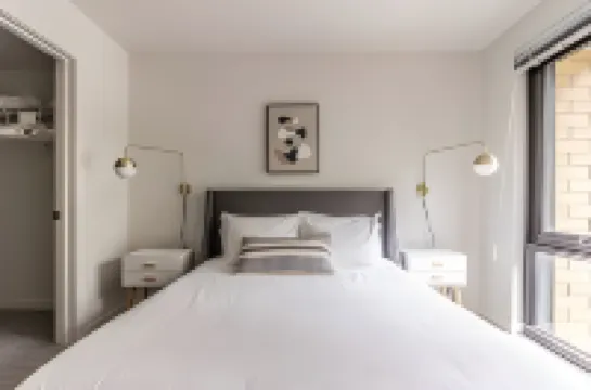 Sleek Kitchen and Ample Space - Chic Downtown Getaway