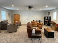 Open Floor Concept and Entertainment Room - Charming Coastal Retreat