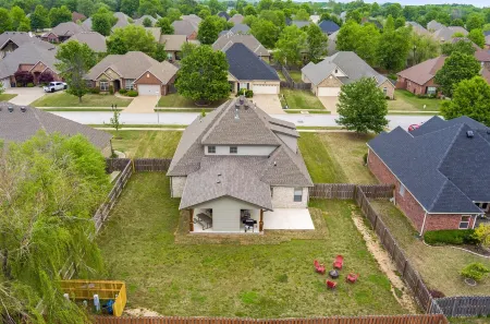 Outdoor Patio with TV and Fire Pit for Relaxation - Charming Oasis