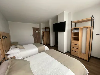 Universitario Hotel Отели в г. 