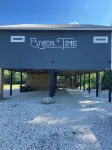 "RIVER TIME" CABIN DIRECTLY ON CADDO RIVER, FLAT YARD