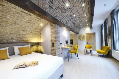 Les Tanneurs Hotels near Passion Garden Theater