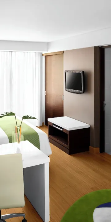 ห้องดีลักซ์หัวมุมพร้อมเตียงแฝดหรือเตียงใหญ่