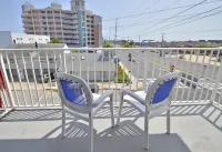 Coastal Palms Inn and Suites - Merinäköala