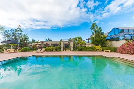 Harrington River Lodge Отели в г. Тари