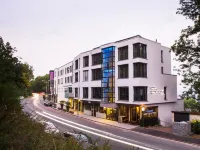 Design-Konferenzhotel & Restaurant Steinernes Schweinchen Hotels near Brasselsberg