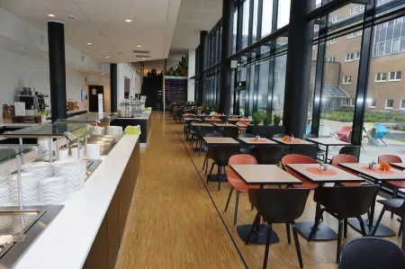 Pingvinhotellet Unn Tromsø Отели в г. Тромсё