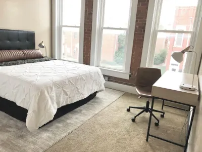 Bright and Spacious Historic Brick Loft off the square in Paola