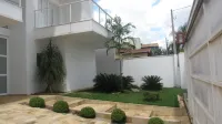 Contemporary style house with 4 suites and 6 bathrooms in gated community