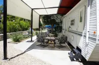 RV on private lot with pool 10 min walk to the beach